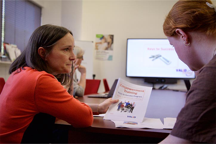 Valid team members teaching an easy read document