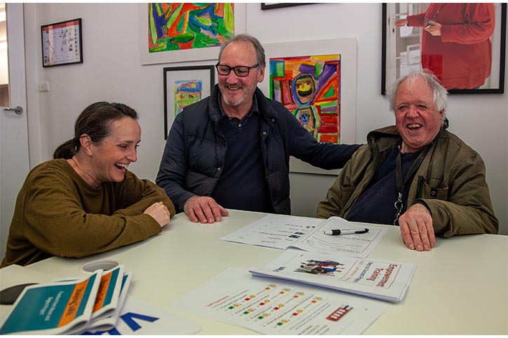 Valid team members teaching an easy read document